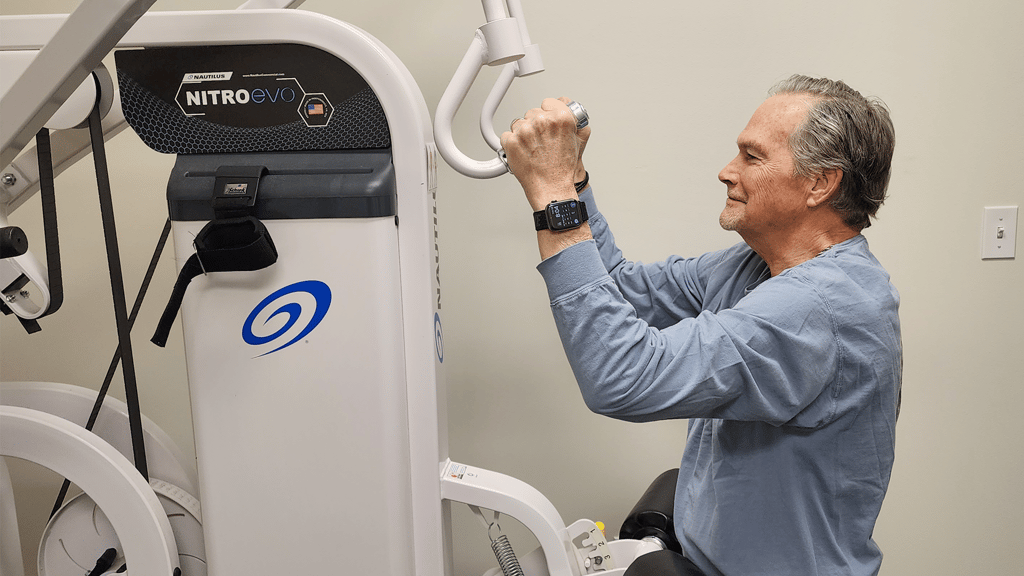 "Member Bill enjoying his workout on a Nautilus machine at The Perfect Workout facility.