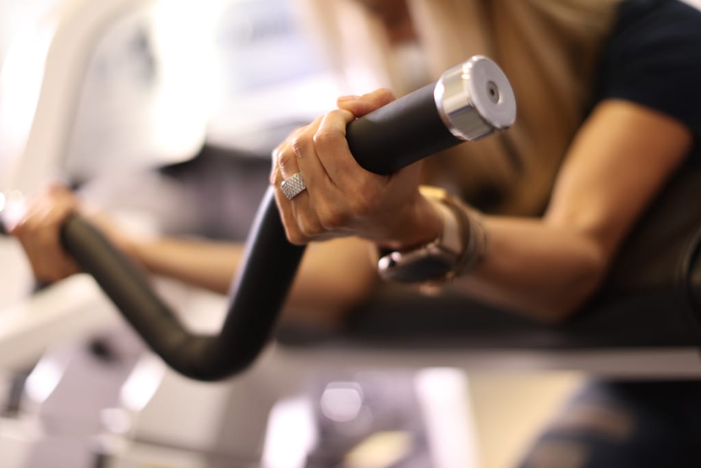 close up of a female working out in a studio