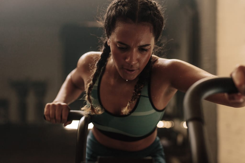 Woman doing a cardio workout on an exercise bike