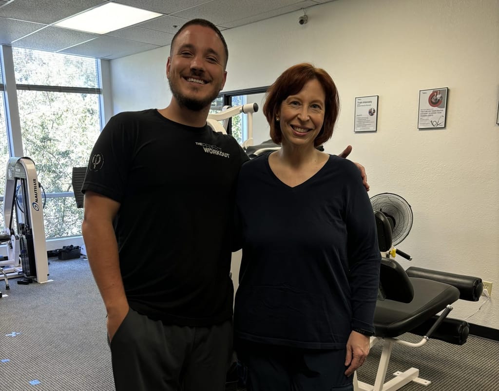 on the left is personal trainer Will from the san mateo studio and on the right is member Darcy