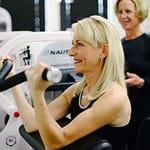 woman in her 60s strength training