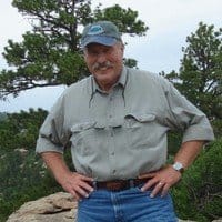 male client smiling and posing for the camera