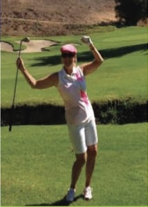 Female Client celebrating on the golf course