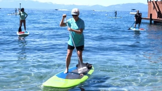 Virtual Strength Training Client on a stand up paddleboard in Walnut Creek, CA