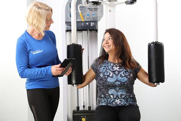 Female Personal Trainer with real female client