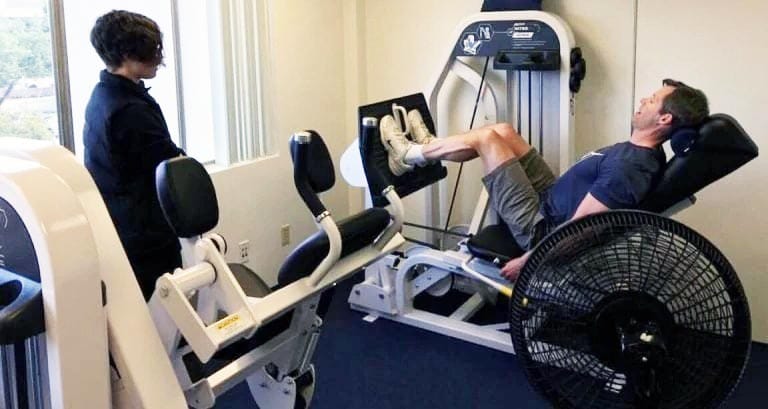 Matt Hedman slow motion leg press at The Perfect Workout