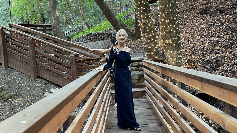 image of a female posing for a photo in the woods