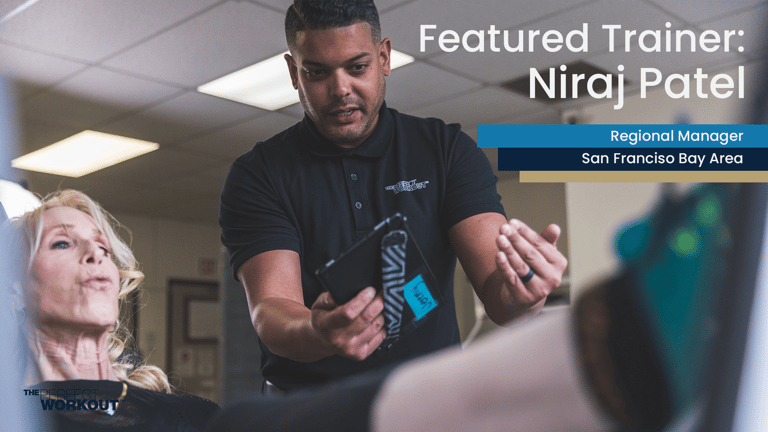 Image of Regional Manager Niraj Patel instructing a member on the leg press