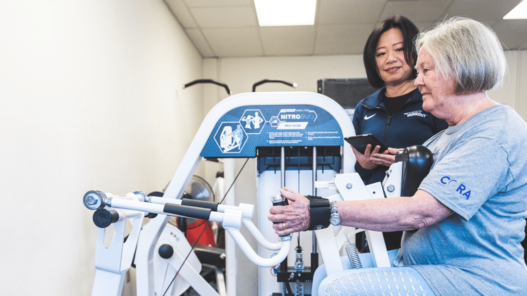 A member of The Perfect Workout performs the Compound Row exercise
