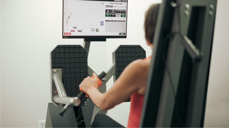 A woman working out her arms