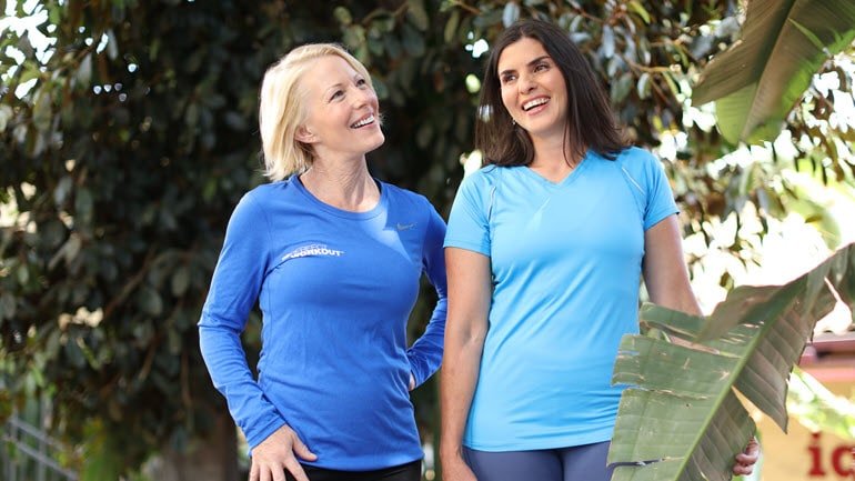 weight_loss for personal training clients Trainer and client smiling together