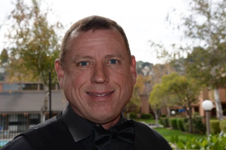 Male client smiling