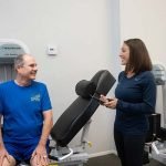 Female Personal Trainer with Male Client consultation