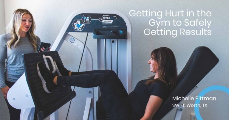 Female member on leg press machine with personal trainer