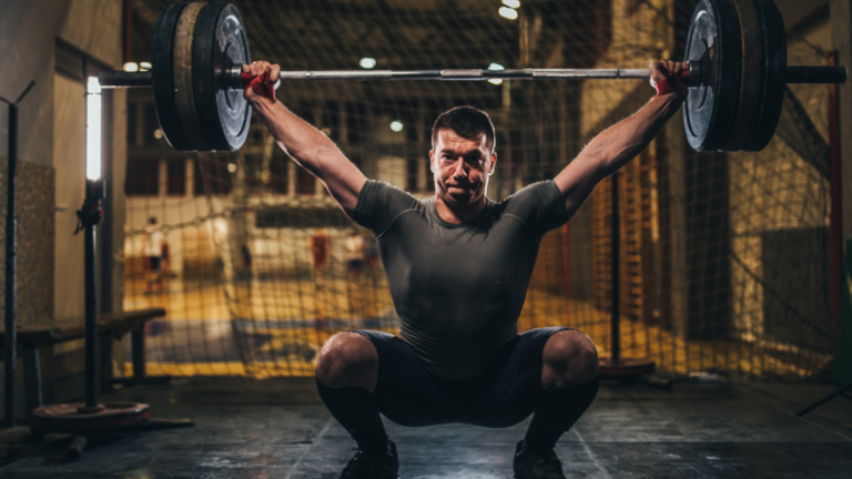 body builder holding their breath while lifting