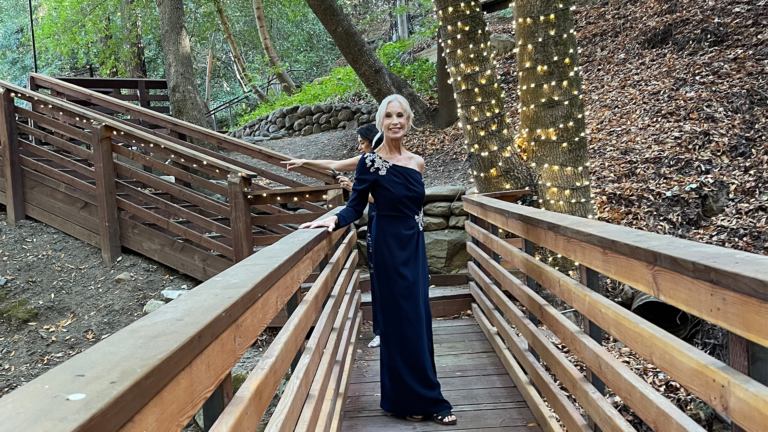 image of a female posing for a photo in the woods