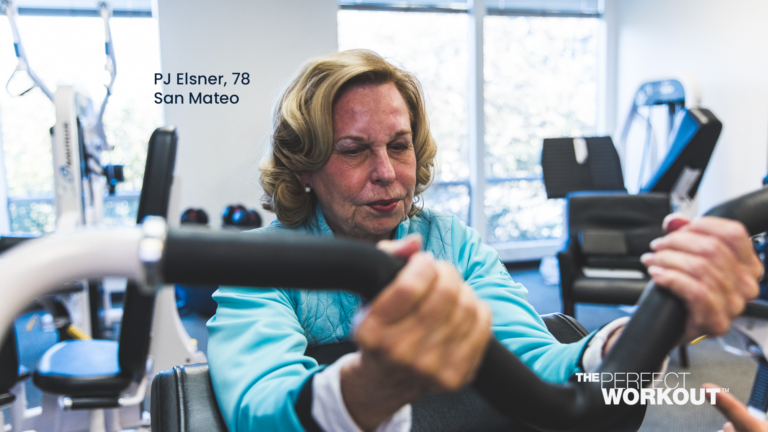 Image of PJ doing the preacher curl at The Perfect Workout