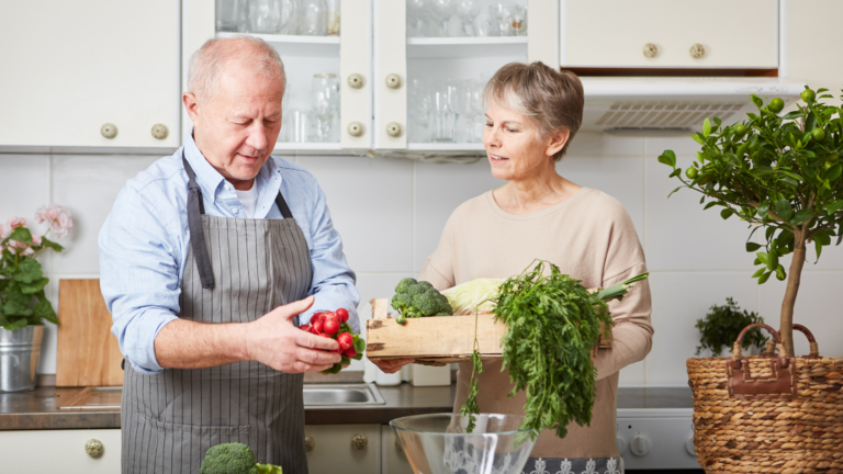 Couple preparing vegetables for a healthy meal