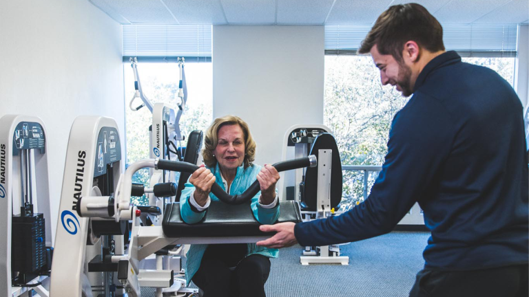 A woman who is fit and healthy from slow motion strength training that helps combat hight cortisol levels